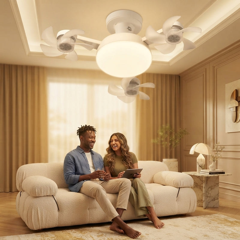 A sleek silent LED ceiling fan light installed in a modern, high-end living room with a couple relaxing on a sofa.